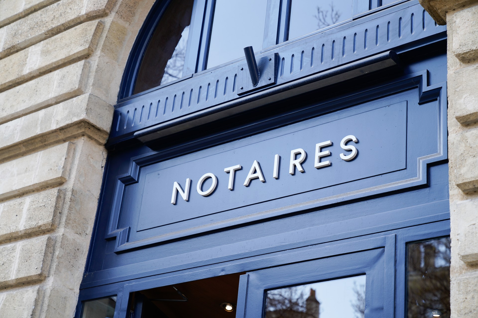 notaires text means notary french sign logo in building office